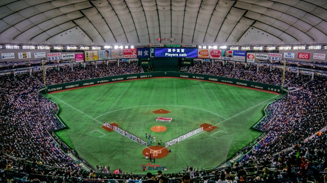 <strong>Fans and food: </strong>Try the takoyaki (fried dough balls stuffed with octopus) and join the fans when they begin boisterously cheering from the stands.