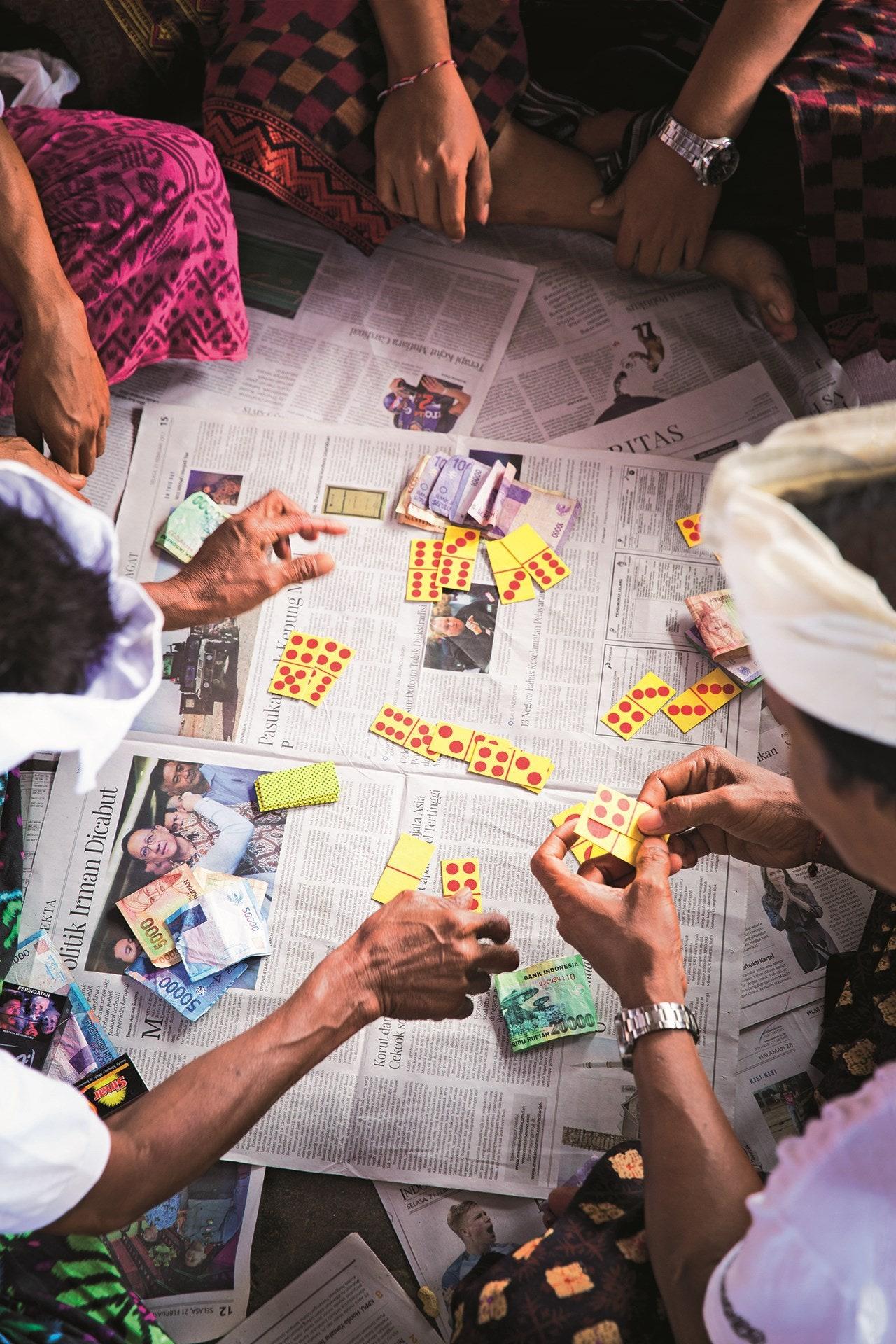 A domino game at Batu Bolong beach